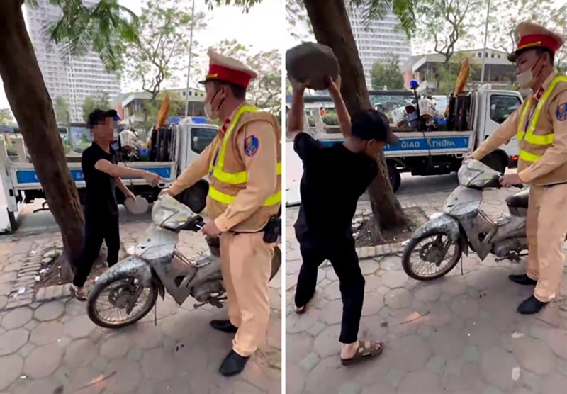 video ghi lại cảnh một người đàn ông có hành vi gây rối tại chốt CSGT, dùng gạch đập xe máy đã bị niêm phong tạm giữ video ghi lại cảnh một người đàn ông có hành vi gây rối tại chốt CSGT, dùng gạch đập xe máy đã bị niêm phong tạm giữ